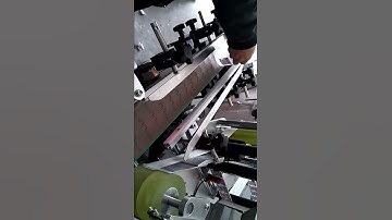 Automatic tube labeling machine