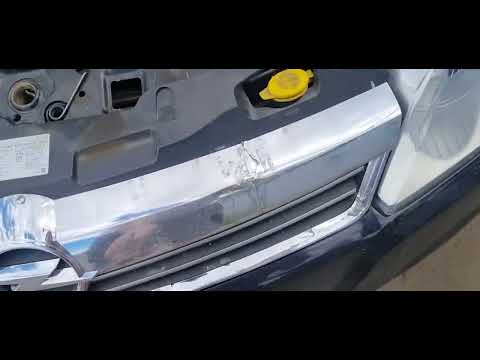 Как снять решетку радиатора Opel Astra H ?.mp4