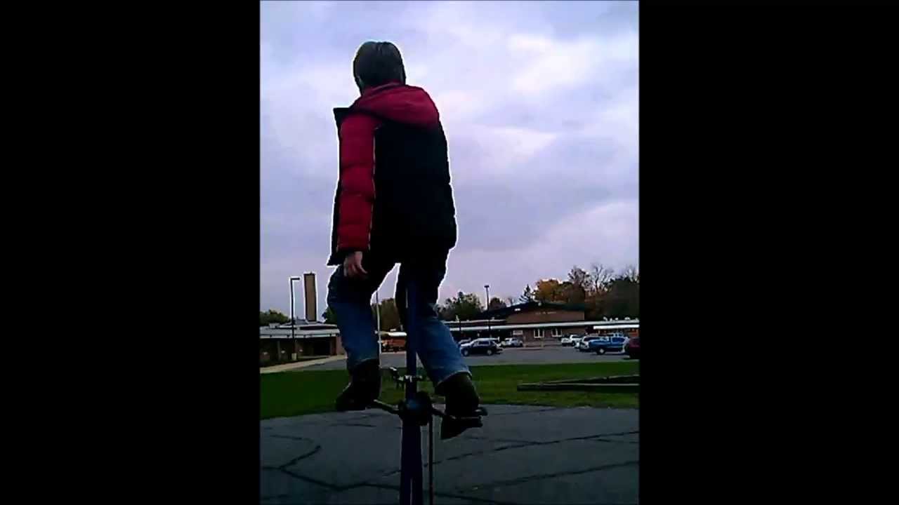 Kyle on a 7 foot tall unicycle YouTube