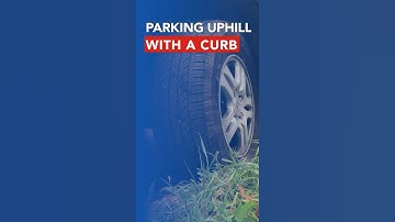 Correct parkeren bergop met stoeprand voor rijexamen