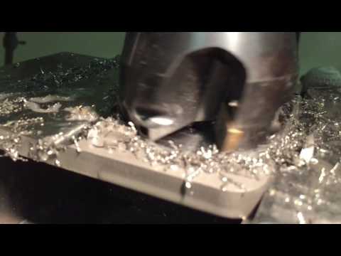 Face milling a base plate between metal 3D printing builds