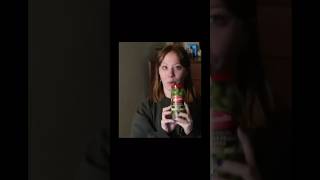 Woman Opens Andrew Wilson Olive Jar