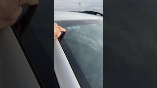 Where to put toll bridge transponder on Subaru windshield