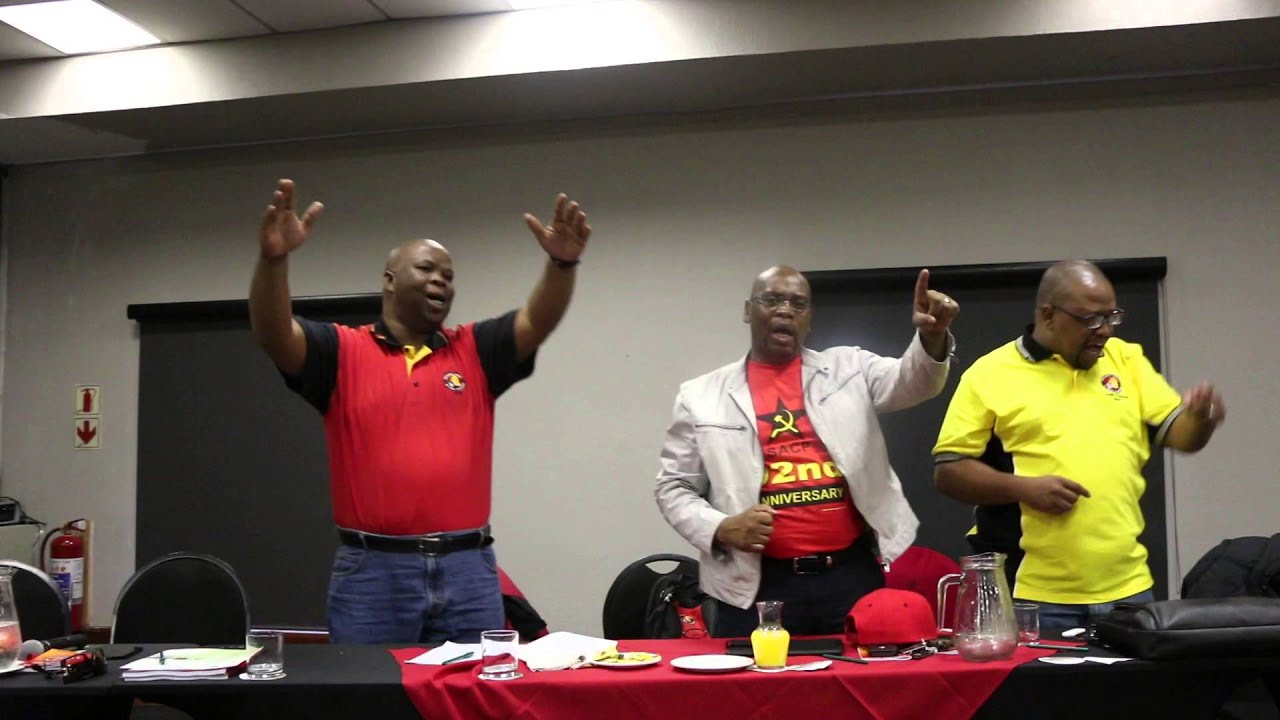 Acting NUM President singing and dancing with delegates