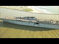 USS Bonhomme Richard being towed to scrapyard in Brownsville Texas