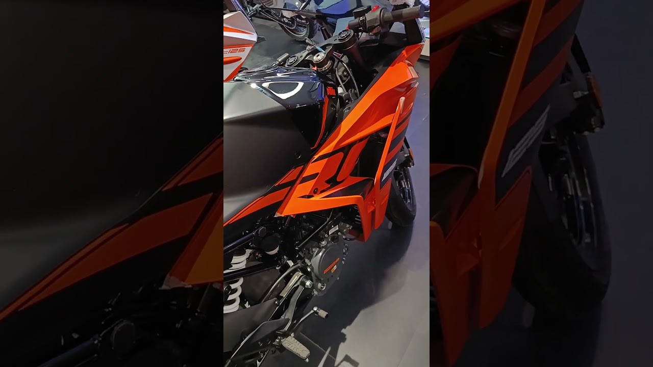 Graphics, RC 125 New Black Orange Color Side Profile 2024