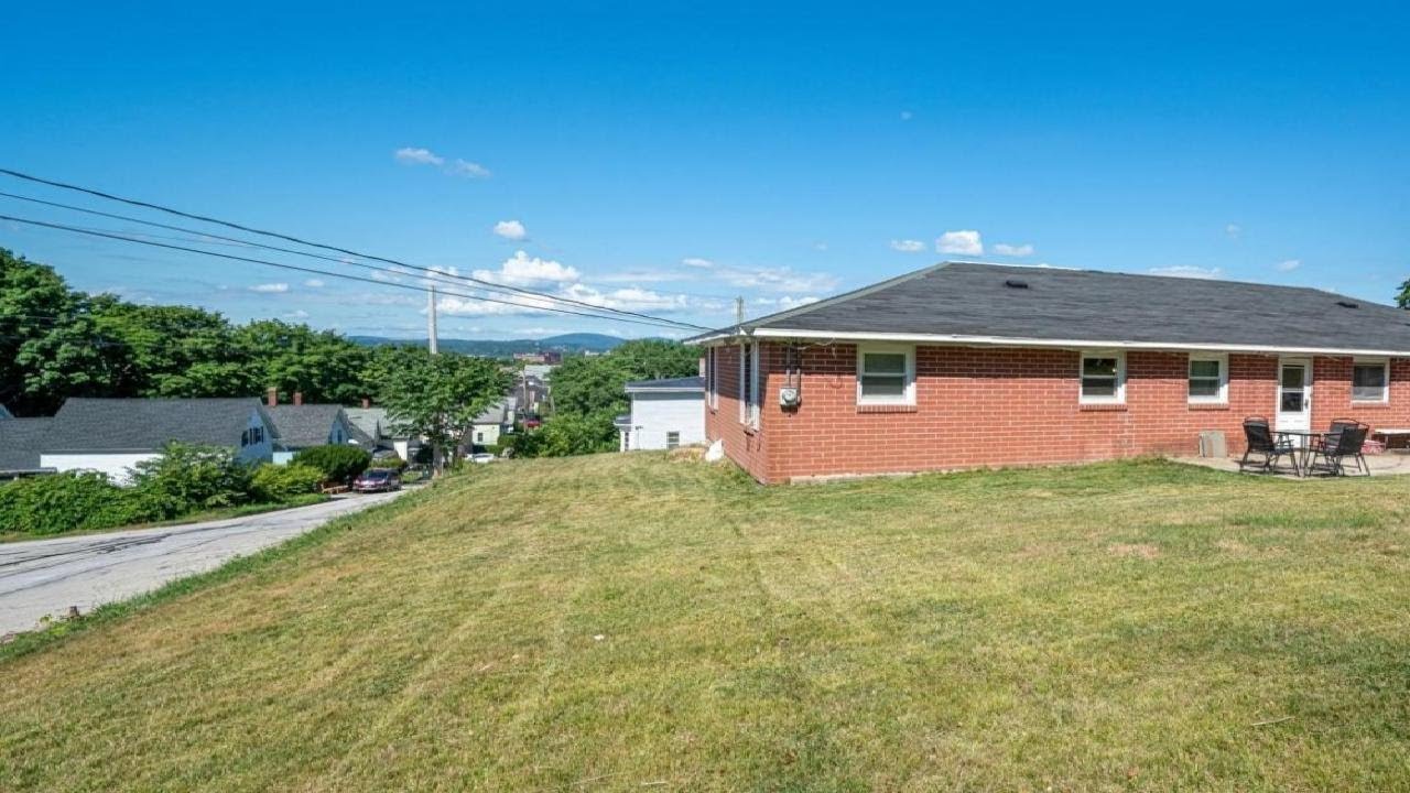 489 Belmont Street, Manchester, NH Presented by Brandon Whitcher.