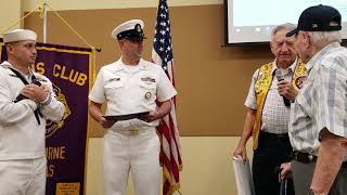 U.S. Navy Sailors present flag to 98-year-old vet