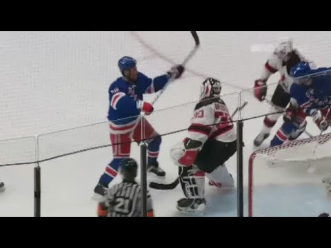 Mike Rupp roughing Marty Brodeur. NY Rangers vs New Jersey Devils