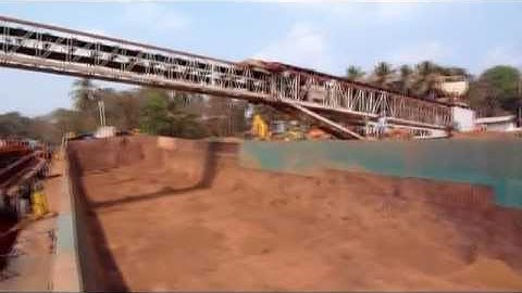 TS Radial Telescopic and Truck Unloader loading Iron ore to Barges @ 1500TPH