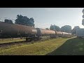 A SD60M, a SD40-2, and a GP38-2 hauling an OC manifest train.
