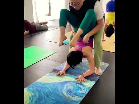 Yoga trainer helping girl in exercise for her flexible body #yoga #exercise #workout #gym #trainer
