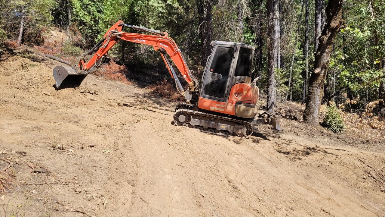 Almost slipping off a bank with the Kubota KX 040 4 - YouTube
