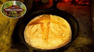 Baking Homemade Sourdough Bread in a Clay Oven in the Forest