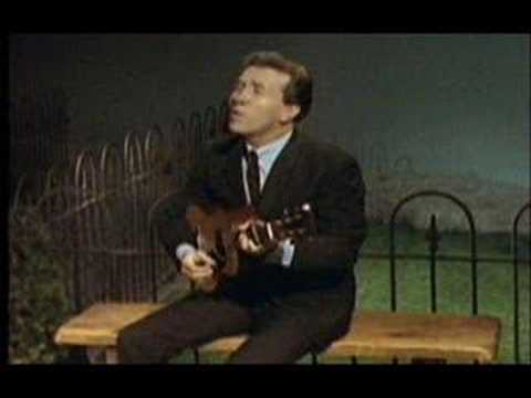 Marty Robbins Sings 'Only A Picture Stops Time.'