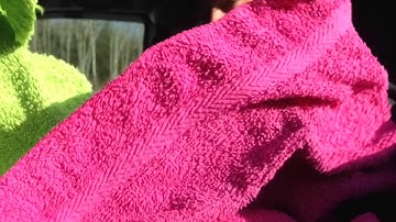 Loud music makes towels dance using car audio subwoofers