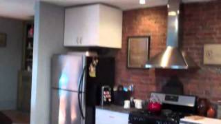 Loft condo in Adams School House with interior balcony