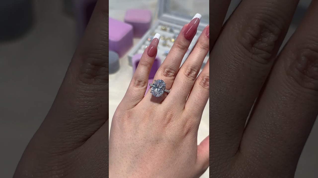 Excellent Crushed Ice Oval Sona Simulated Diamond Engagement Ring