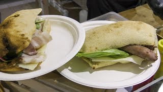Warm Flat Bread with Cheese, Ham and Sausage. Italian Street Food
