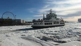 Suomenlinna Ferry Breaking Through Ice in the Frozen Baltic Sea in Helsinki