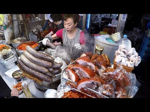 Korea Street Food. Pig Meat, Blood Sausages, Fish Cake, Pancakes and More. Gwangjang Market, Seoul