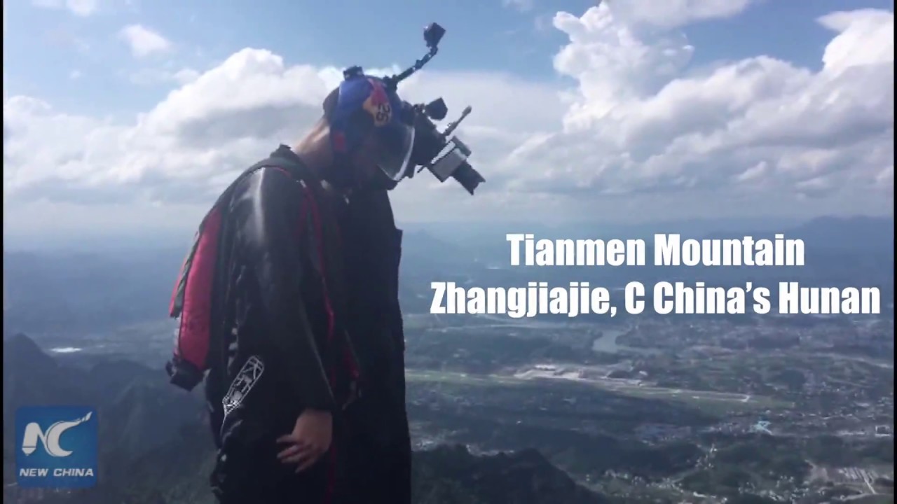 Wingsuit daredevil hits moving target