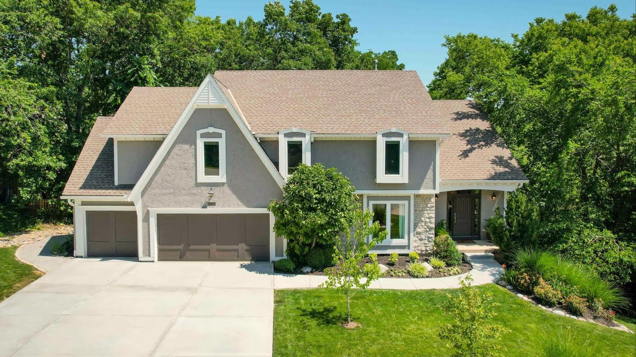 Discover Tranquility at 14606 W 55th Place in Lakeview Estates