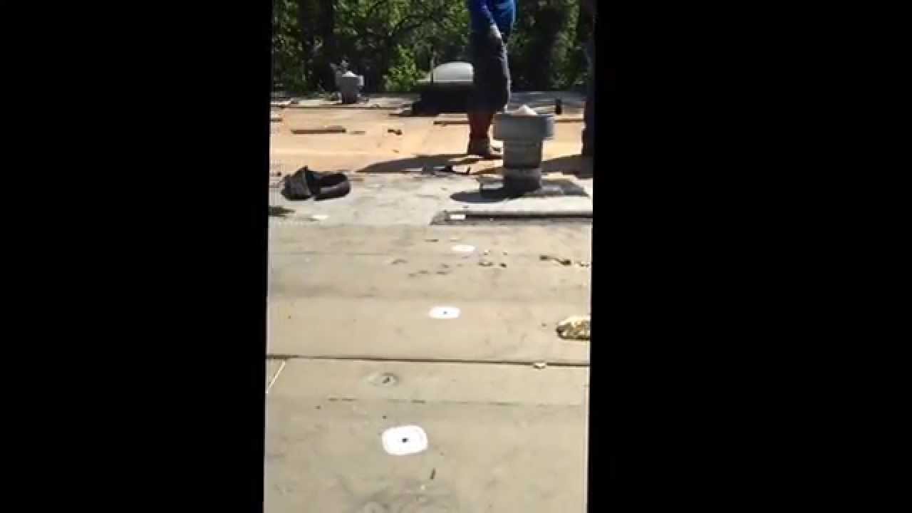 New flat roof being installed by Complete Roofing Solutions 