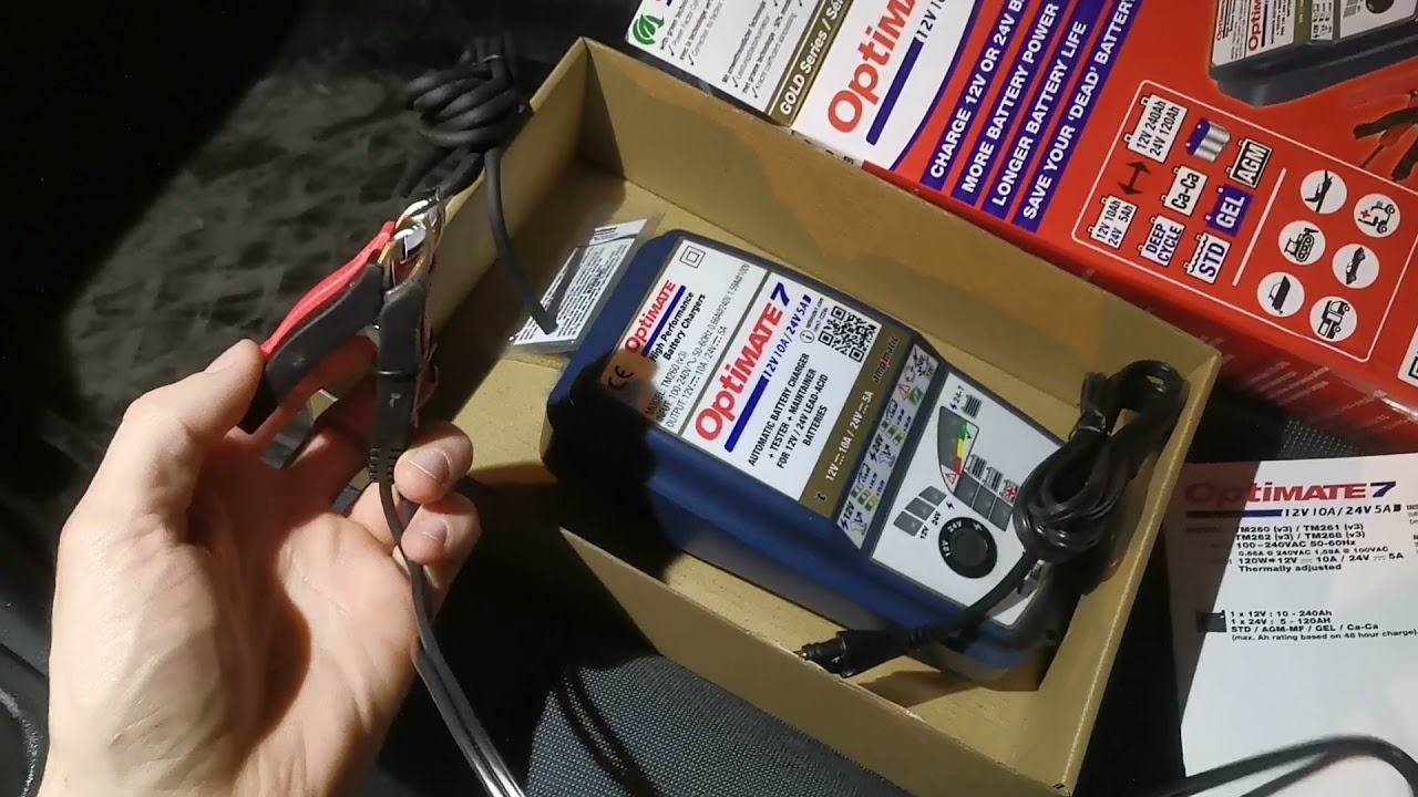 вскрытие коробки OptiMate 7