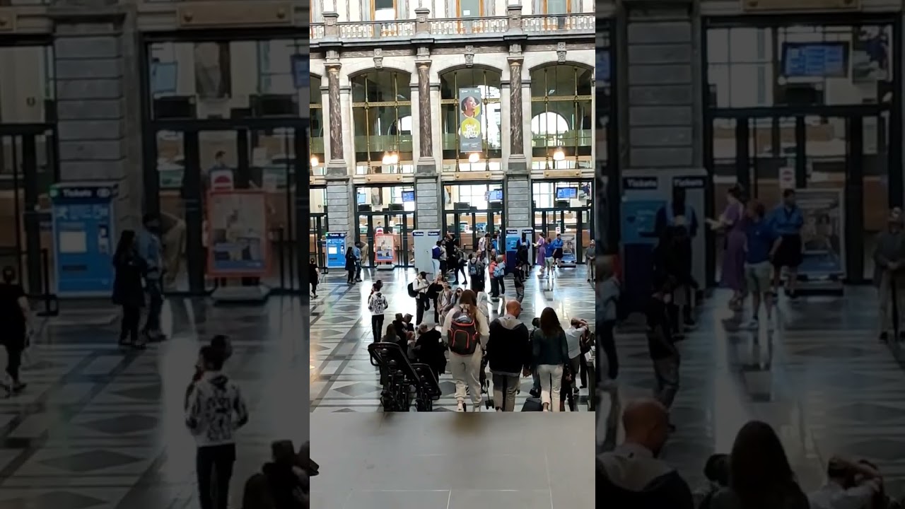 Are you here now ? inside Central Station Antwerp Belgium 