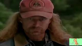 Chuck Norris grabs the chainsaw with his hand