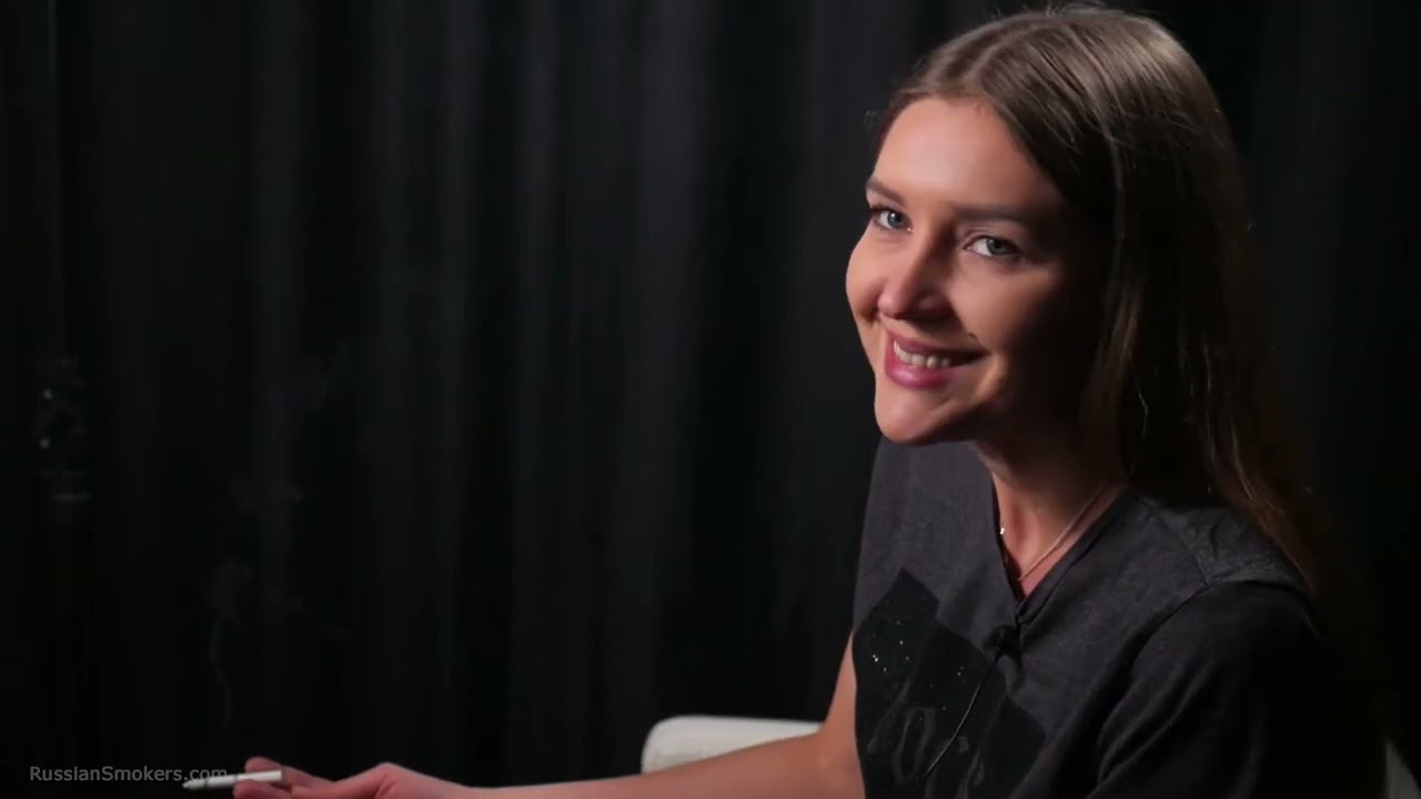 Pretty russian girl Kate is giving an interview and smoking 100mm cigarettes