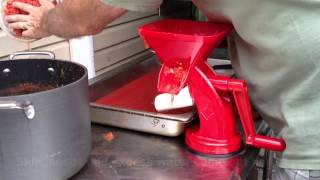 Pressing the tomato flesh