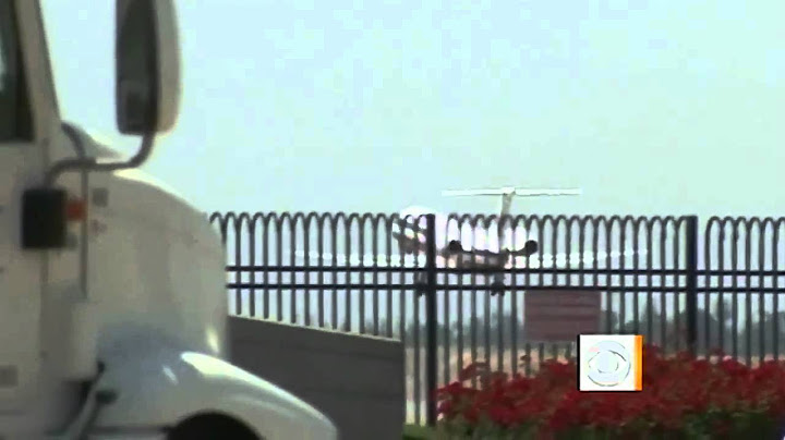 Airline passenger tries to open emergency door mid-flight