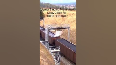 Coal Train getting sprayed with polymer binding foam to keep dust under control!