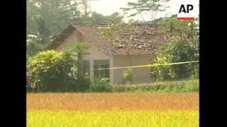 AP cover of police storming suspected militant hide-out