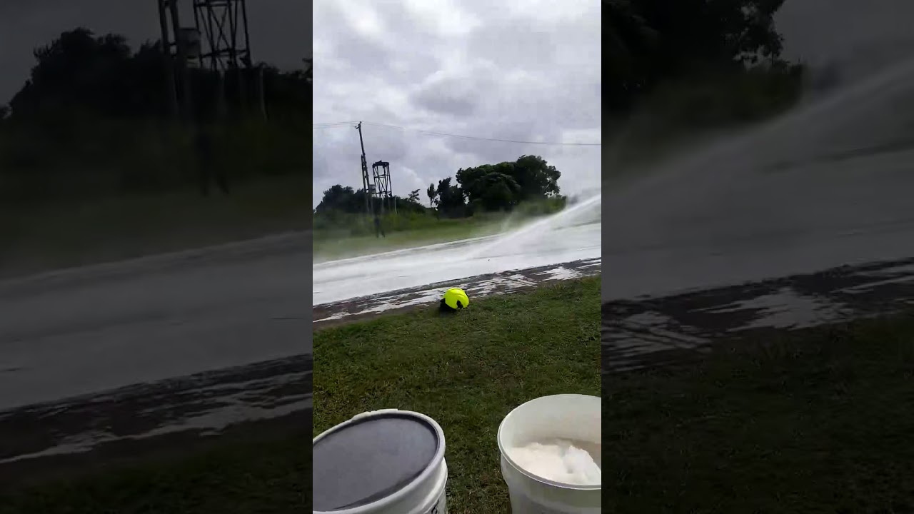 St. Kitts Fire & Rescue doing some cleaning up after a gas truck turn