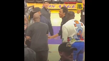 JAY-Z attempts to calm Denzel Washington down during heated argument at Lakers game