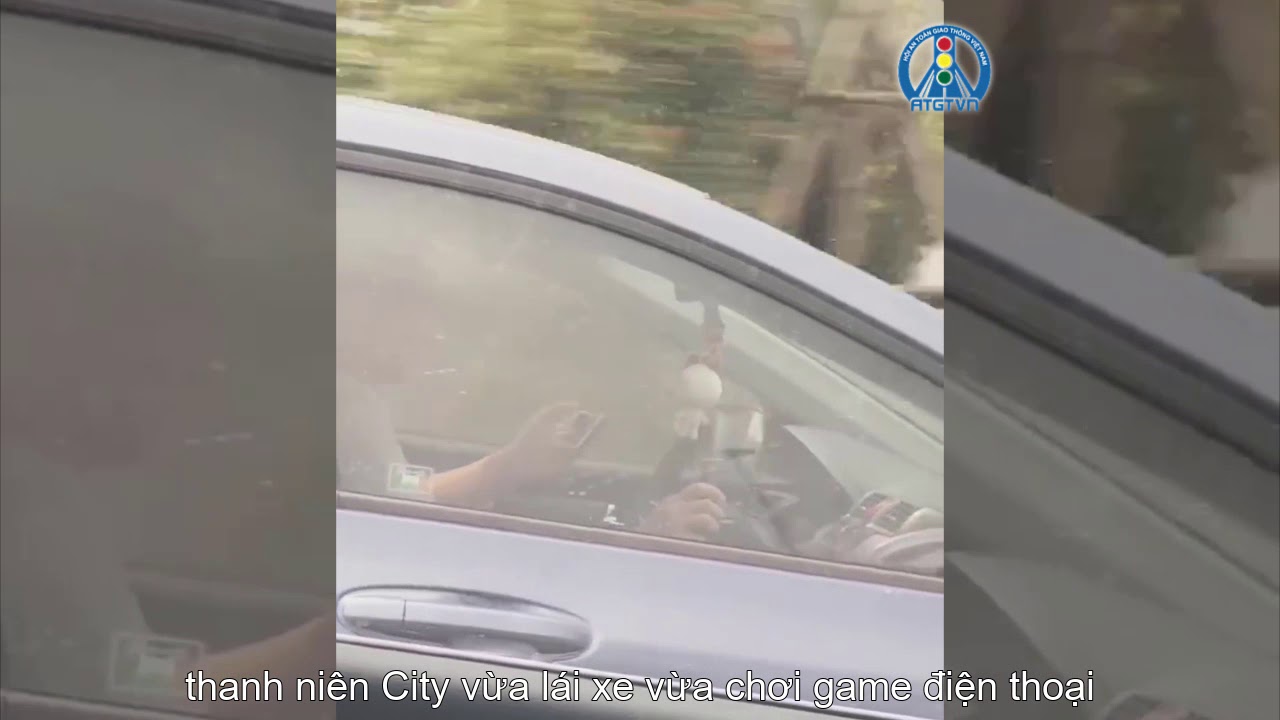 Playing game while driving car