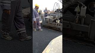 This Massive Road Machine Lays Asphalt Like Butter