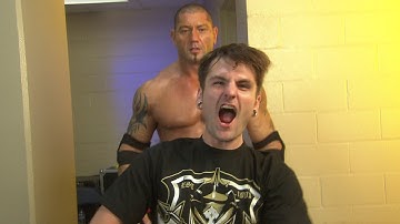 A WWE fan sneaks backstage to see Batista