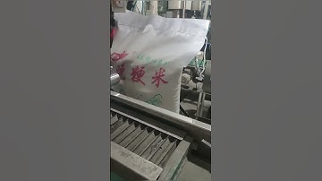 Leadjet 25 Dots V680 CIJ Inkjet Date Coding machine is coding dates on rice waven bags