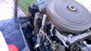 making adjustments to idle speed on a 70hp Evinrud