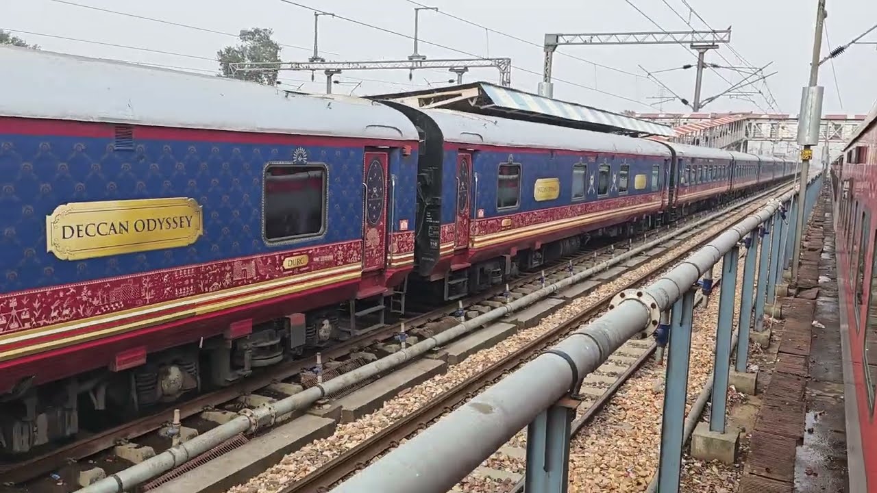 Jaipur Pune Express passing by Deccan Odyssey at Sawai Madhopur