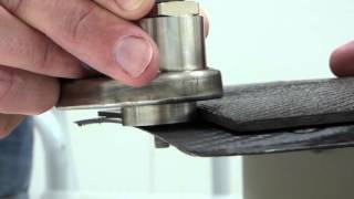 Trimming 2.5mm carbon fibre epoxy composite materials using an air router with vacuum shroud