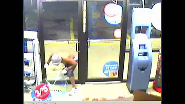 Surveillance video catches thief breaking through glass door