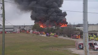 Firefighters battle 4-alarm warehouse fire in northwest Houston