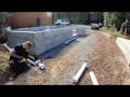 Footing Drain, Rock, Fabric, Drainboard Scraps and Finally a Back filled Garage Foundation