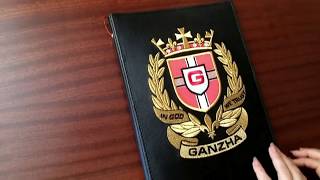 Folder with embroidered family coat of arms