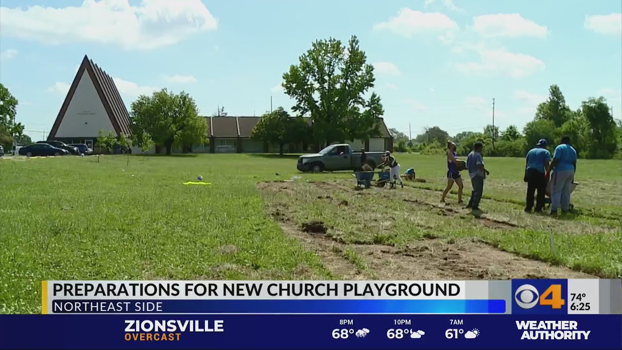 Volunteers build church playground for Indy's northeast side community